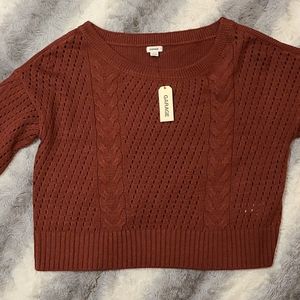 Cable knit sweater from Garage
